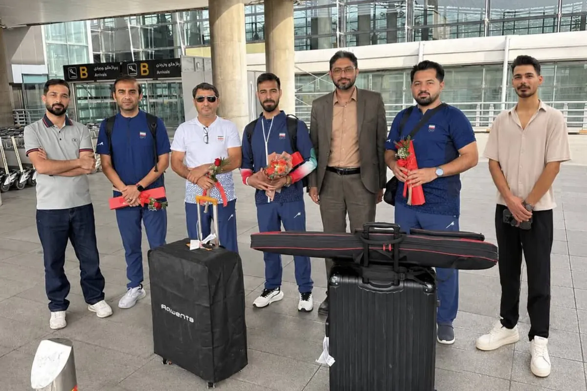تیرانداز قمی در ناگویا با استقبال نمایندگان قم وارد ایران شدند