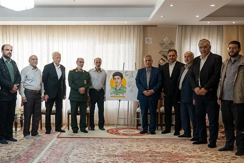 رونمایی از پوستر ورزشکار بسیجی شهید "حسین دلیراکبری" در تبریز