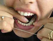 نخ دندان,روش استفاده از نخ دندان,مسواک زدن
